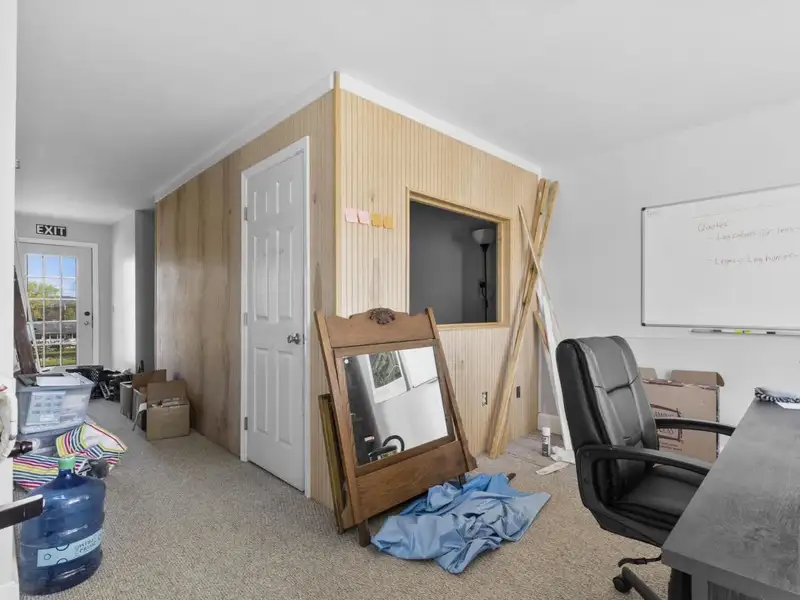 Versatile 4,305 Sq Ft Office Building with Apartment on Highway 11e