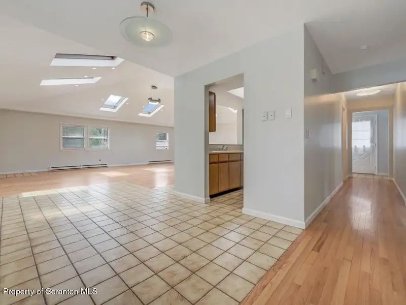 Mixed-use Property in Throop: 7-bay Garage and Updated 2-bedroom Apartment