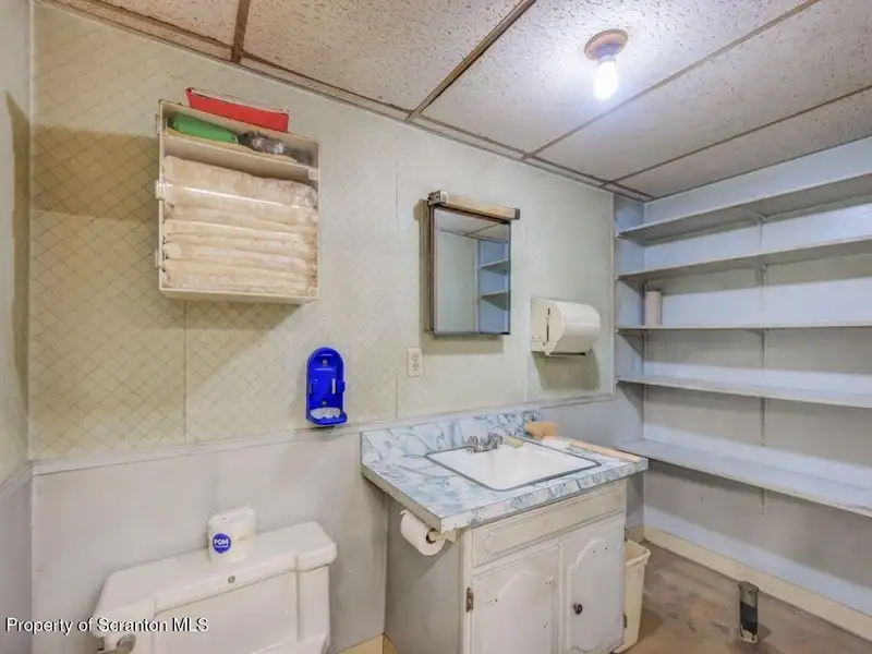 Mixed-use Property in Throop: 7-bay Garage and Updated 2-bedroom Apartment