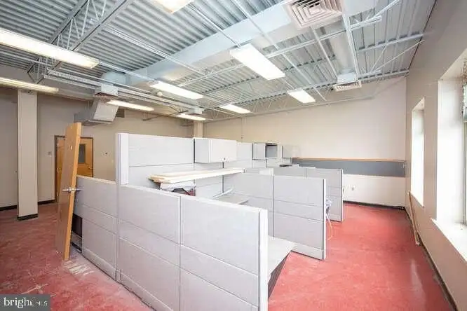 Versatile 6,000 Sq Ft Commercial Space in Prime Location with Parking Potential