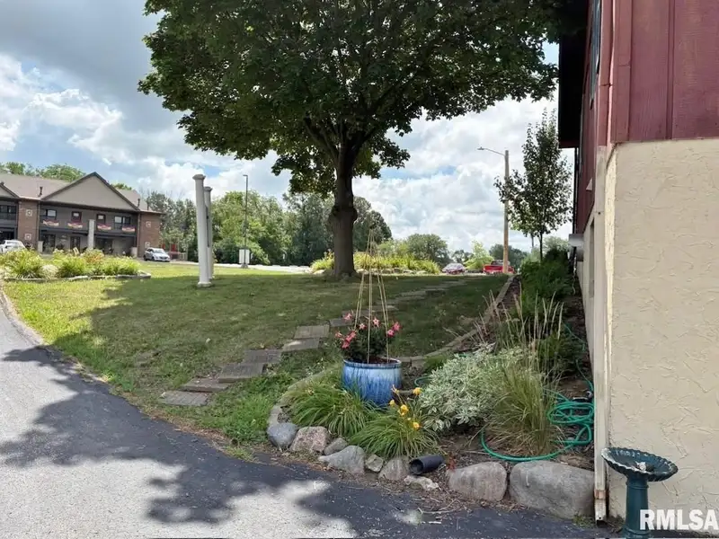 Versatile C-1 Zoned Property with 4 Bedrooms in Northwest Peoria Corner Lot