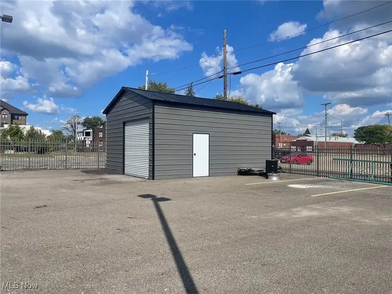Well-maintained Two-story Brick Building with Retail and Workshop Space in Ne Location