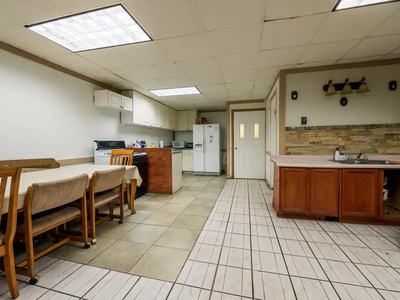Mixed-use Property with 1-bedroom Apartment in Well-maintained Building