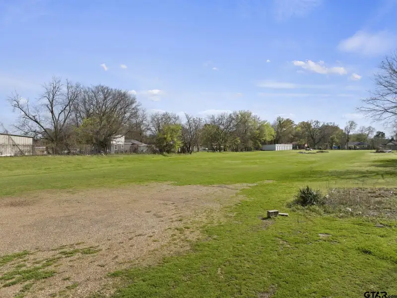 2-acre Commercial Property with Storage Units and Dual Road Frontage