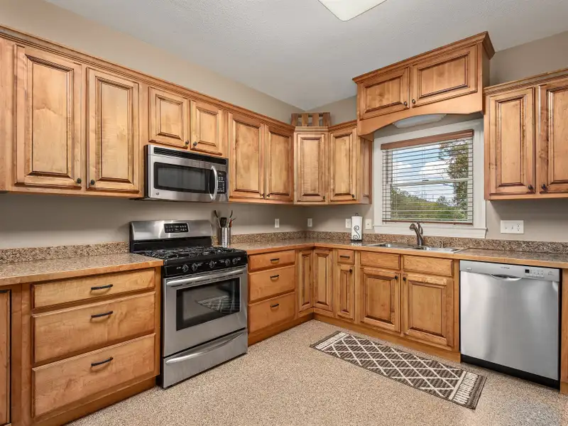 Multi-use Property on 16+ Acres with Home, Barndominium, Pond, and Pool in Western Nc