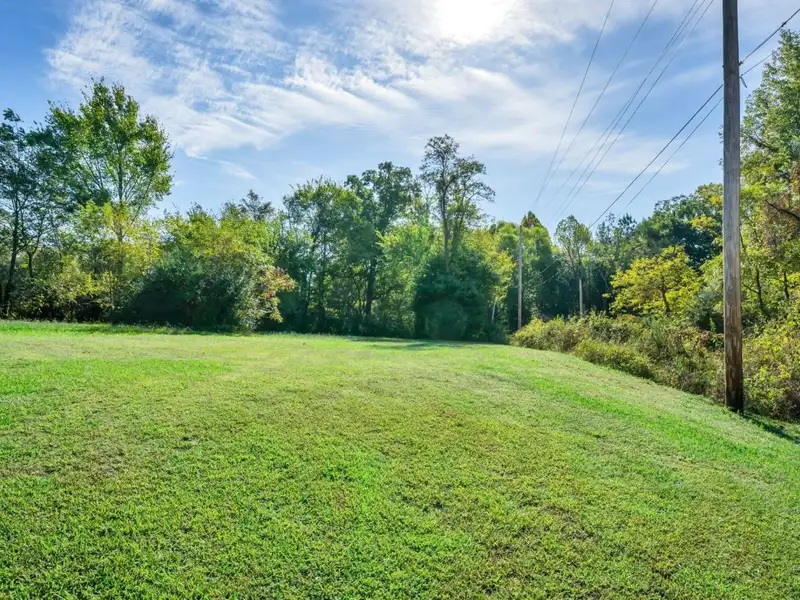 Versatile Commercial Storefront in Growing Lyles, Tn with Ample Parking Options