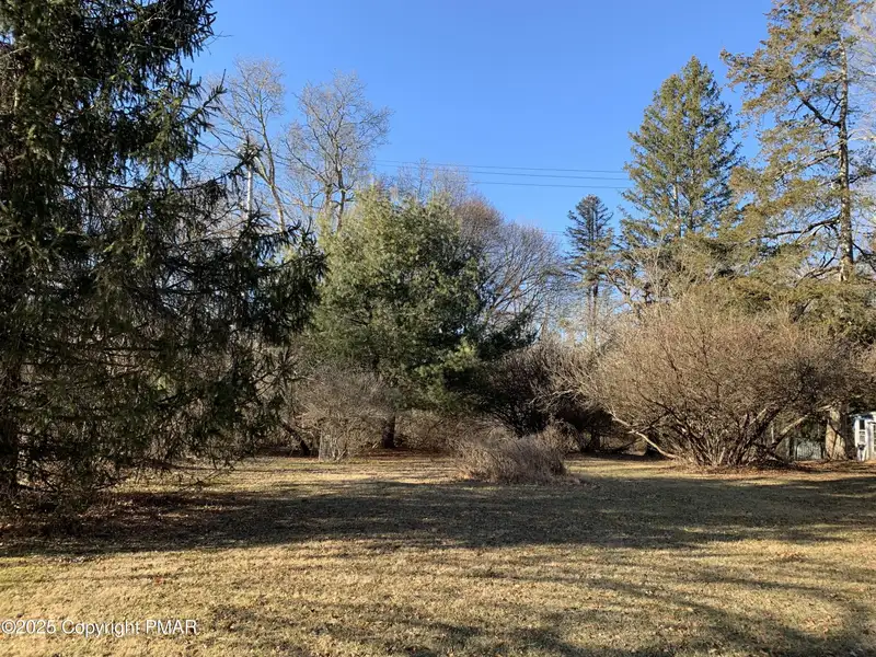 Prime 2-acre Commercial Property with 3-bedroom Home in High Traffic Area