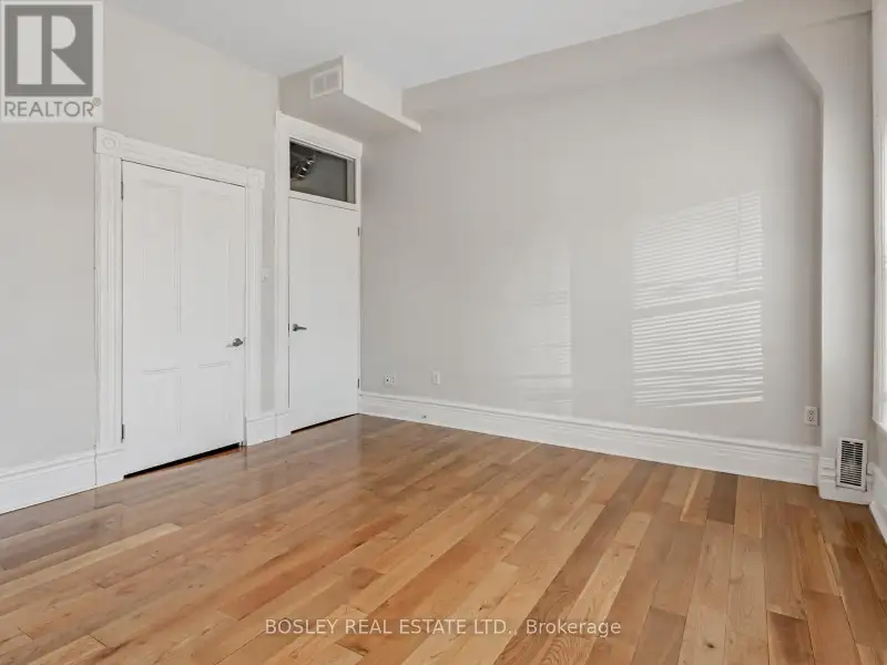 Charming Two-storey Apartment in Landmark Building on Queen St West