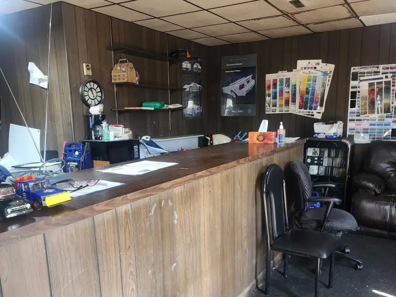 Versatile Commercial Property with Garage Bays and Billboard Income in Prime Location