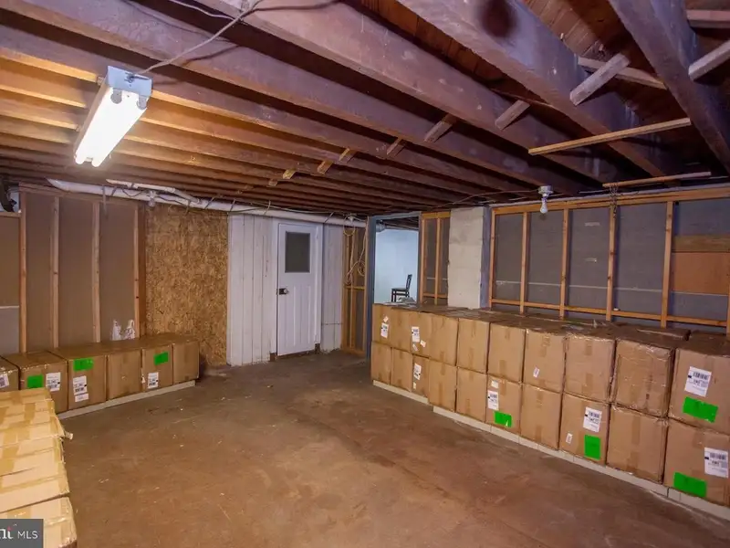 Multi-unit Building with Commercial Space and Two Residential Apartments in Established Location