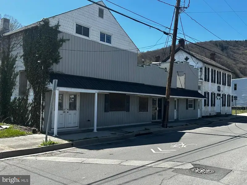 Large Commercial Building with Unique Floor Plan and Adjacent City-owned Lot for Sale