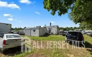 Turnkey Automotive Business with Car Dealership, Mechanic & Auto Body Shop in Prime Location