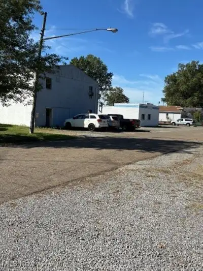 Multi-parcel Commercial Property with Storage and Rustic Office Space on 0.76 Acres