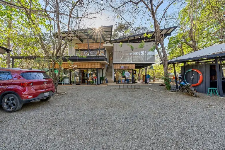 Commercial Plaza for Sale in Playa Avellanas, Features Restaurants, Shops, and Community Space
