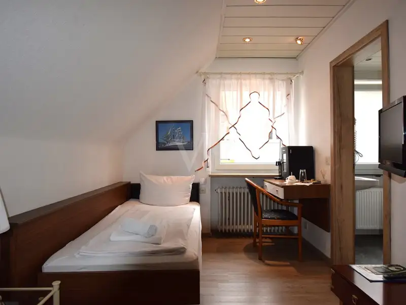 Historic Family-run Hotel in Ansbach with Restaurant, Guest Rooms, and Green Energy Features