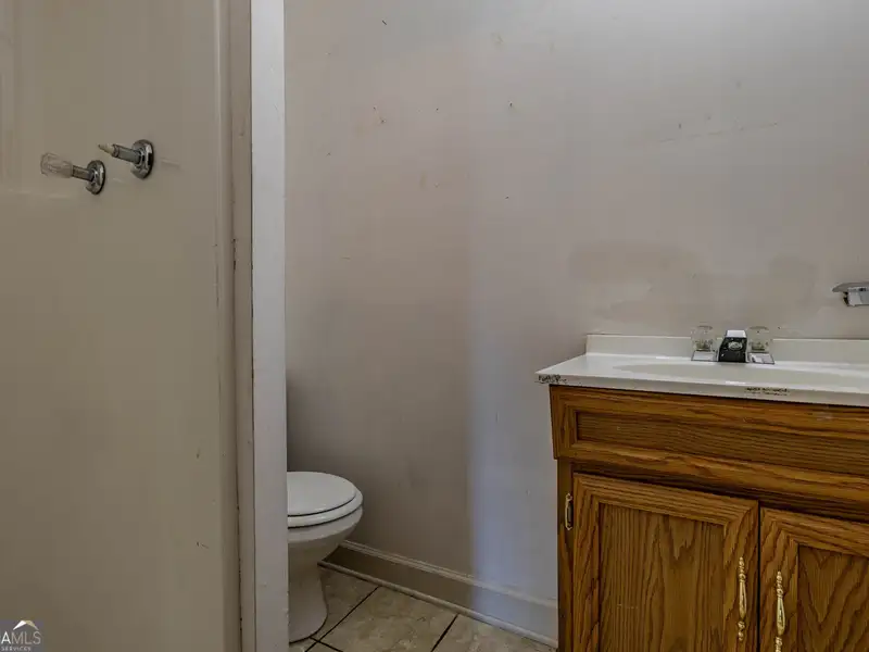 Versatile Commercial Building Near Downtown with Parking and Apartment Potential