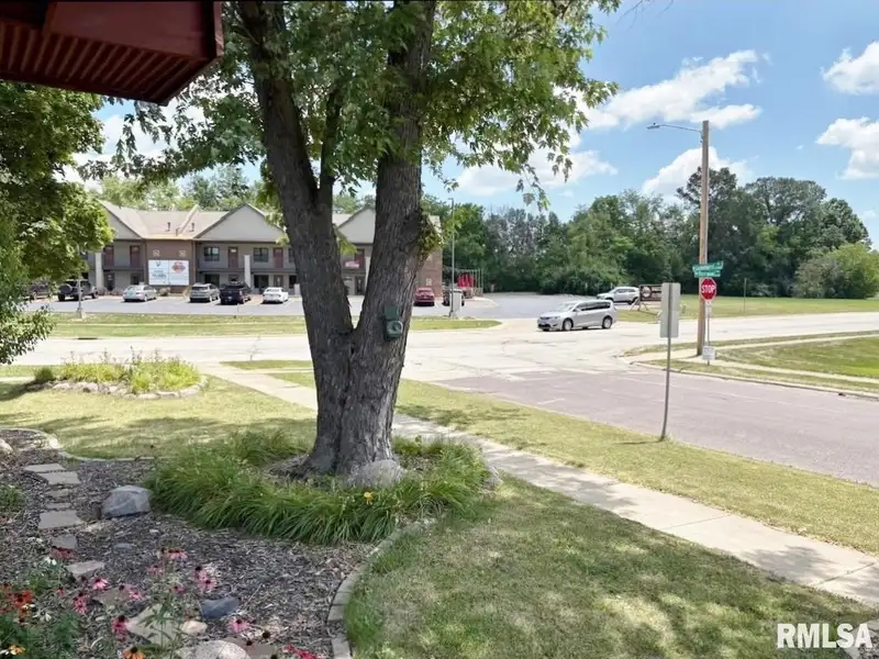 Versatile C-1 Zoned Property with 4 Bedrooms in Northwest Peoria Corner Lot