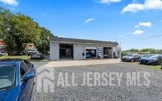 Turnkey Automotive Business with Car Dealership, Mechanic & Auto Body Shop in Prime Location