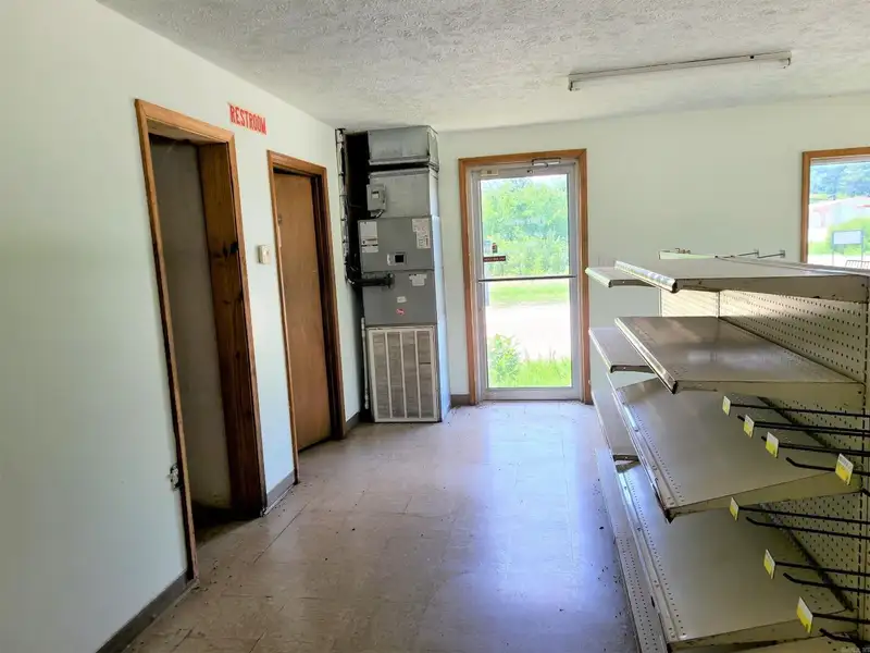 Commercial Property with Highway Frontage, Multiple Buildings, and 6 Acres in St. Joe