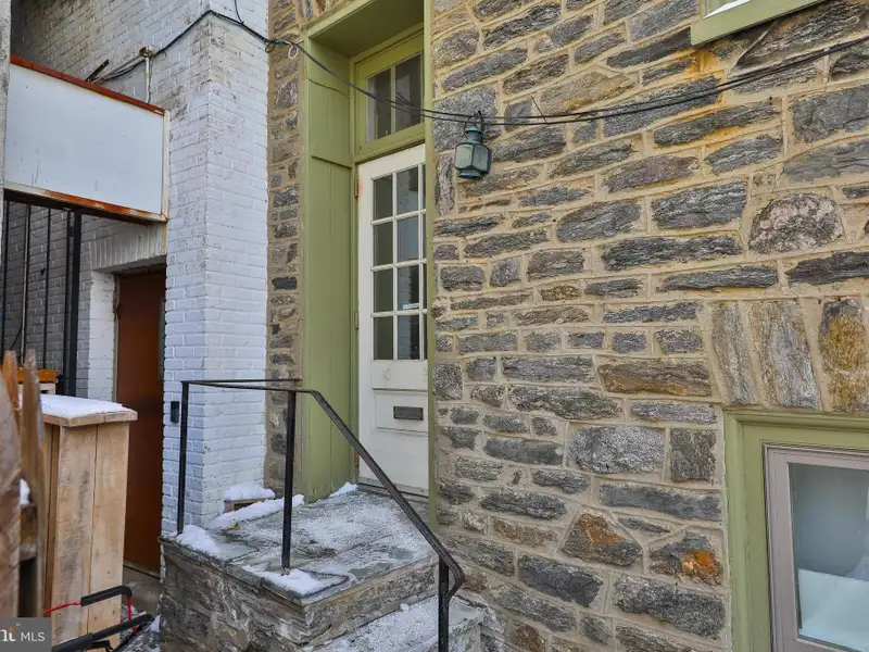Historic Multi-use Building in Chestnut Hill Business District with Retail and Residential Units