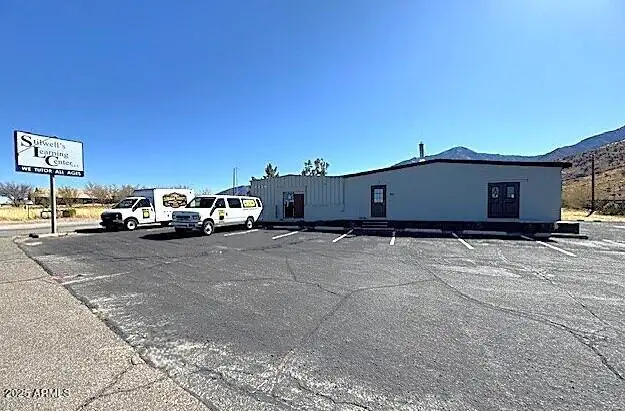 Versatile Commercial Property at High-traffic Intersection, Ideal for Business or Residence