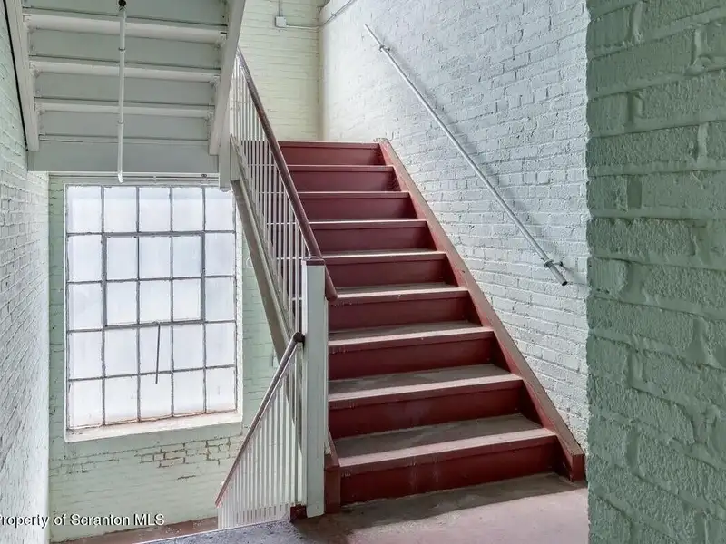 Four-story Commercial Property with Elevator Access and Basement in Prime Location