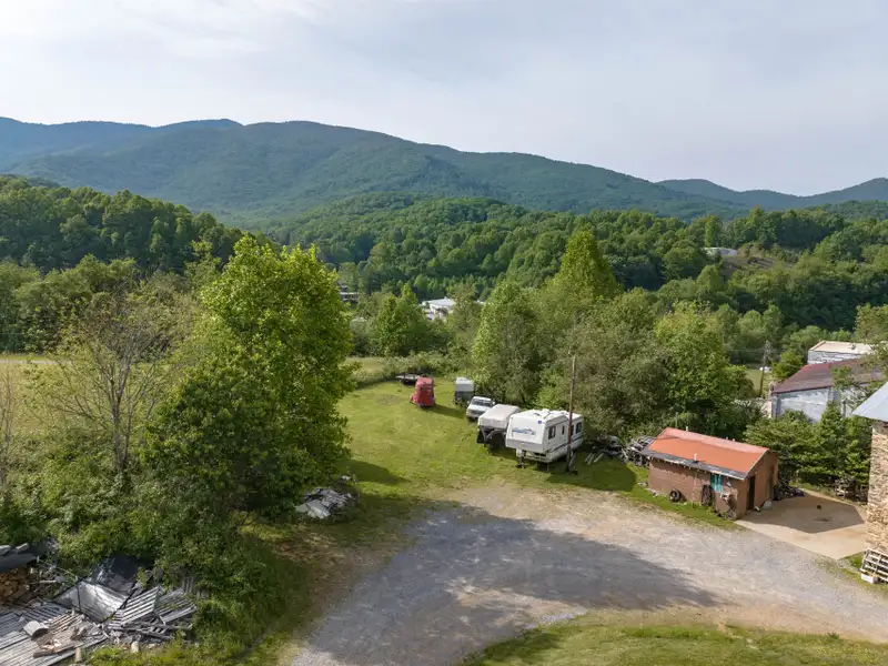 Historic 1918 Stone Building with 3.99 Acres and Detached Workshop in Balsam Road Area