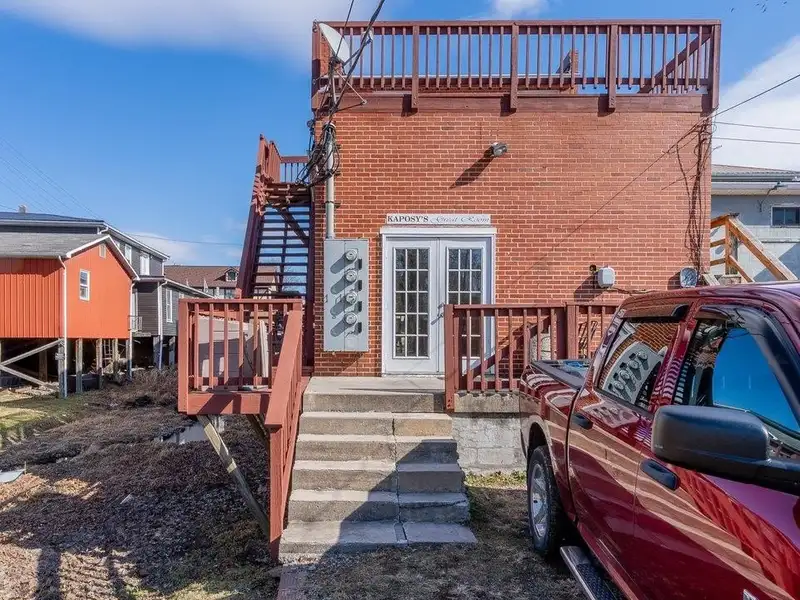 Multi-purpose Investment Building with Storefront, Venue, and Apartments in Petersburg, Wv