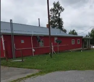 Commercial Property with Living Space Near Beaver Lake, Zoned and Ready for Development