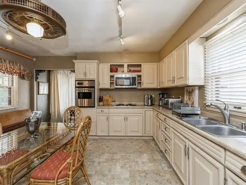 Vintage 4-bedroom Beaverdale Brick Home with Office Suites in Historic Valley Junction