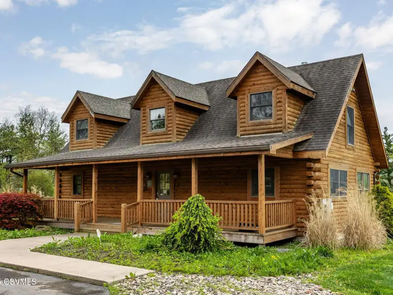 Commercial Log Home on 2 Acres with 3 Bedrooms and Scenic Views