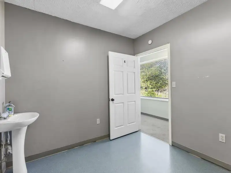 Versatile 4,305 Sq Ft Office Building with Apartment on Highway 11e