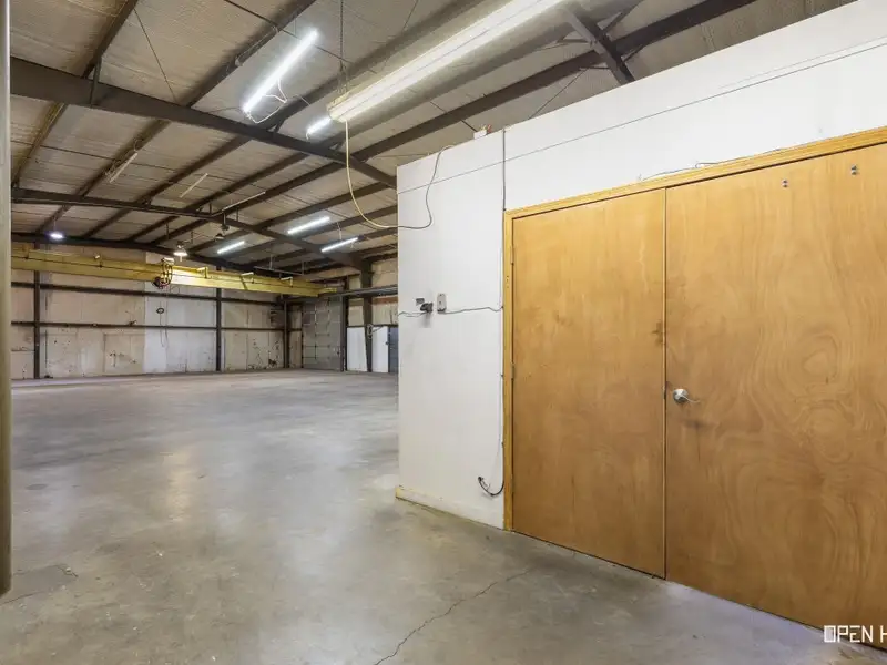 Insulated Warehouse and Office Space with Crane, Fenced Yard in Prime Location