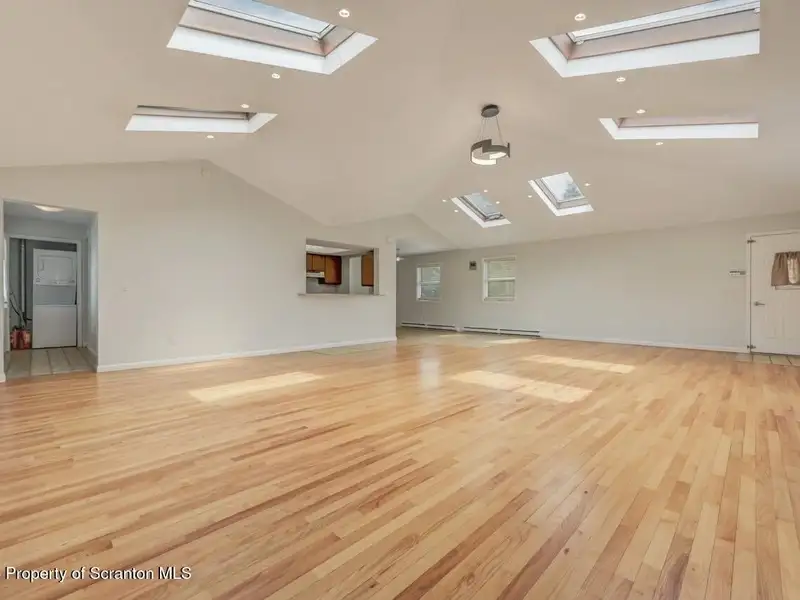 Mixed-use Property in Throop: 7-bay Garage and Updated 2-bedroom Apartment