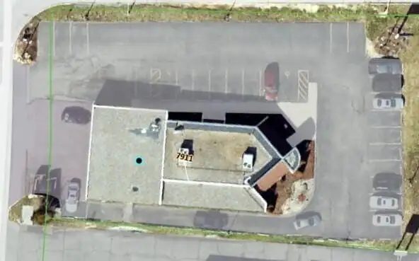 Income-generating Commercial Building with Prime Road Frontage on Mall Rd.