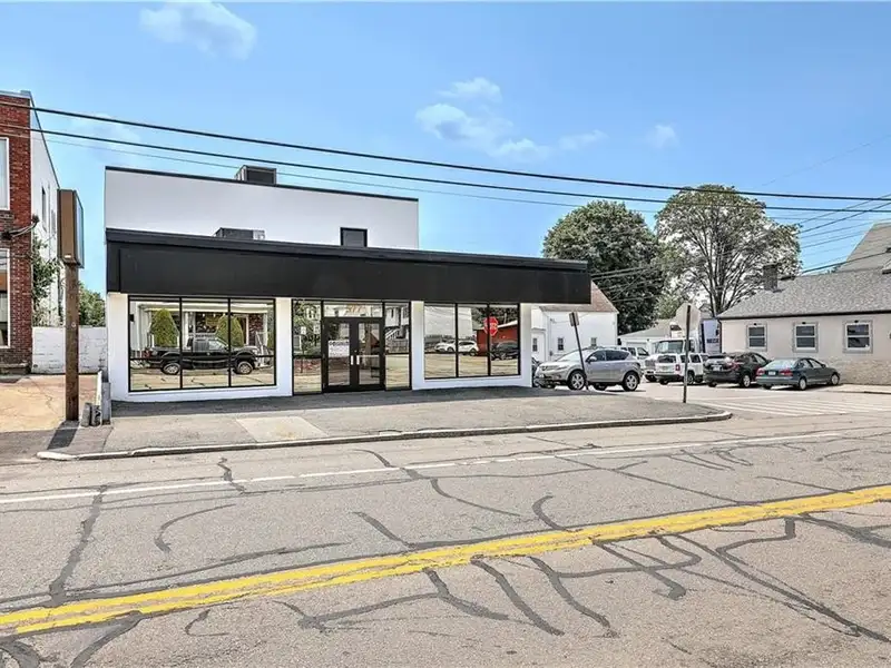 Versatile Multi-level Commercial Building with High Visibility on Major Corridor