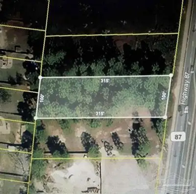 Prime Commercial Lot on Hwy 87 in Navarre, High Visibility and Growth Potential