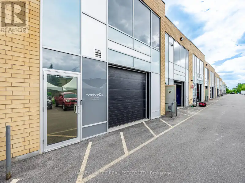 Fully Leased Commercial Condo in Prime Location on the Queensway