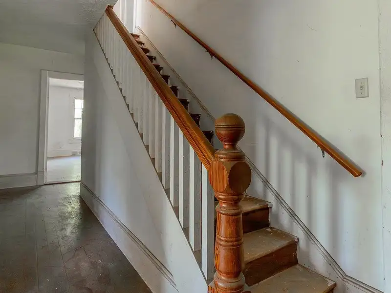 Classic American Foursquare Home in Need of Restoration with Detached Garage