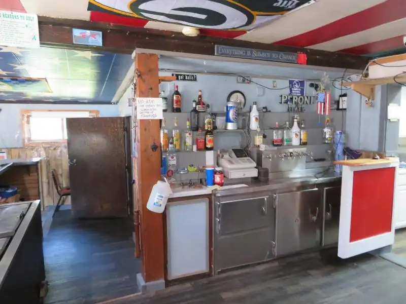 Turnkey Bar/restaurant with 2-bedroom Apartment and Development Potential in Northwoods