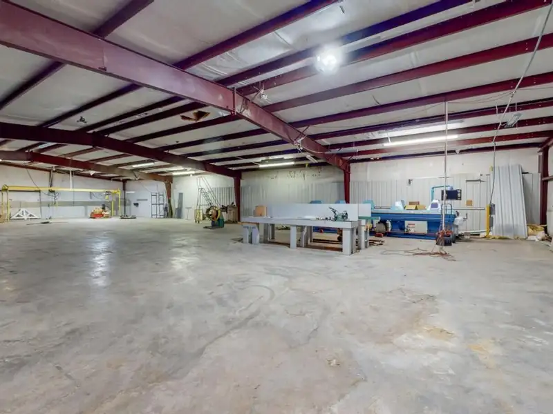 Commercial Property on Busy Highway - 2.1 Acres, 31,000 Sq Ft with Offices and Roll-up Doors
