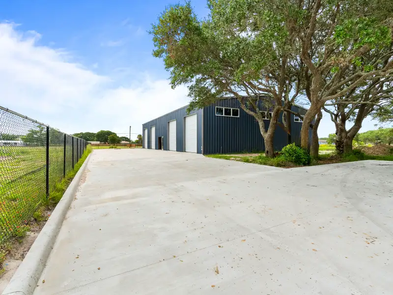 5,700 Sq Ft Warehouse on ½ Acre in Rockport, Texas with Highway Access and Parking