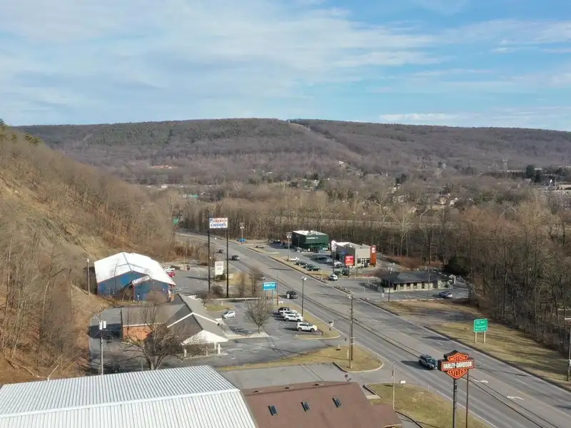 Versatile Commercial Property with Showroom, Offices, and Large Metal Building in Prime Location