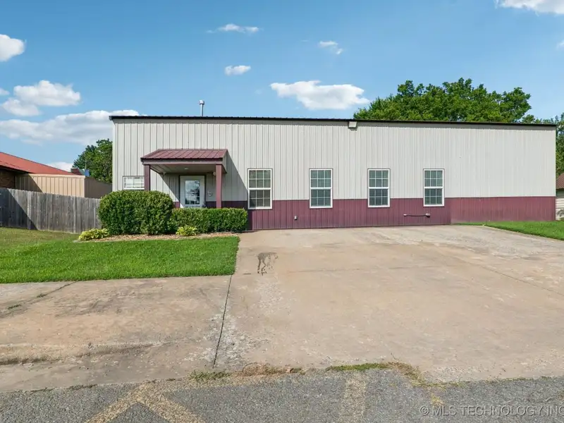 Turnkey Commercial Daycare Property in Downtown Fort Gibson with Dual Buildings and Equipment
