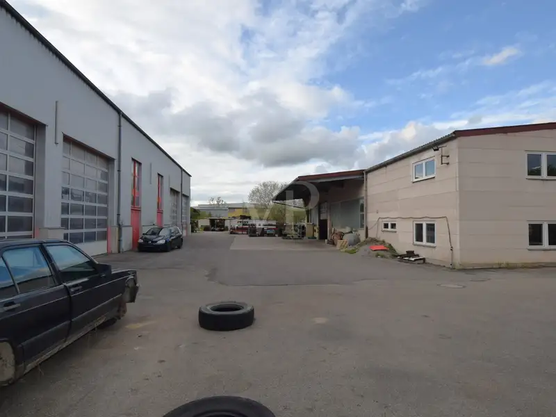 Versatile Industrial Property with Halls, Offices, and Open Space in Prime Location