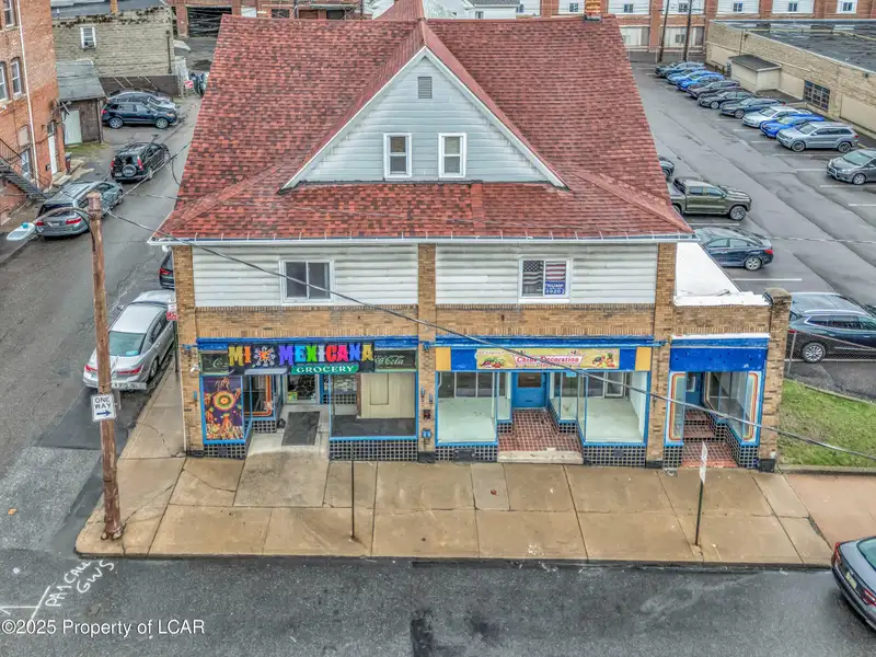 Five-unit Commercial and Residential Building in Prime Location with Recent Upgrades