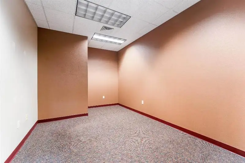 Versatile Commercial Condo for Sale Near Hwy 151 & 41 with Multiple Offices and Amenities