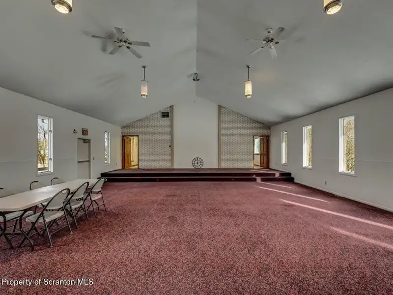Versatile Former Church Building in Peaceful Location with Ample Parking and Creative Potential