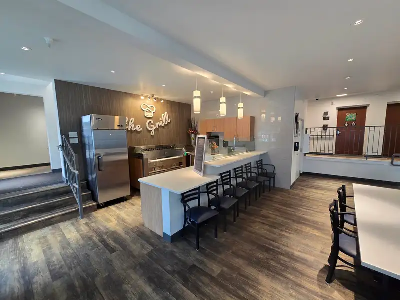 Fully Equipped Commercial Kitchen and Dining Space in Downtown Location