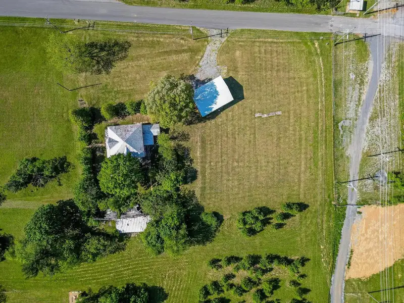 Classic American Foursquare Home in Need of Restoration with Detached Garage